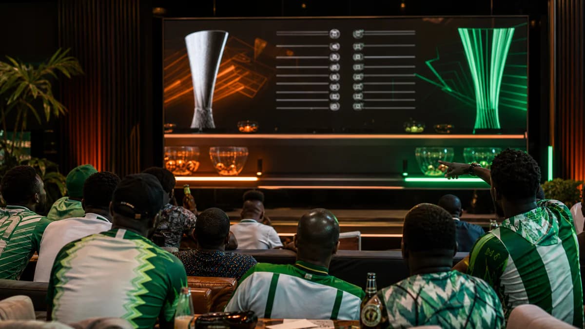 AI editorial image of Nigerian fans watching abstract European football draw graphics in a Lagos lounge